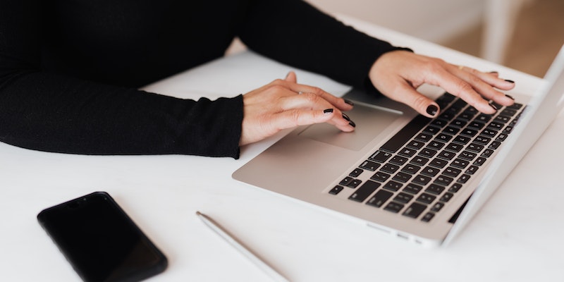 woman using laptop for email validation