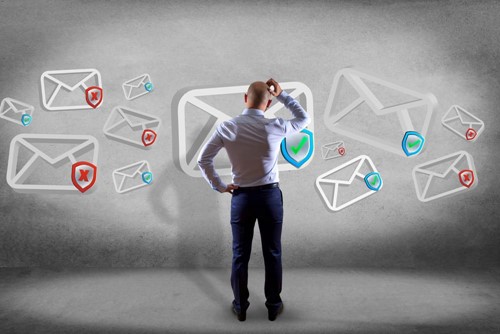 Man scratching head at emails bouncing Email Hippo